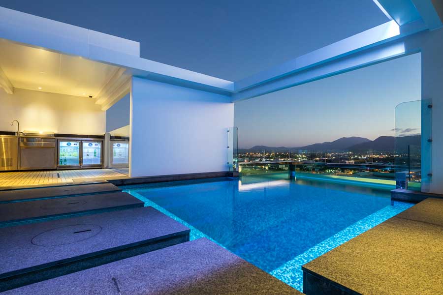 Architectural image of a residential apartment rooftop pool