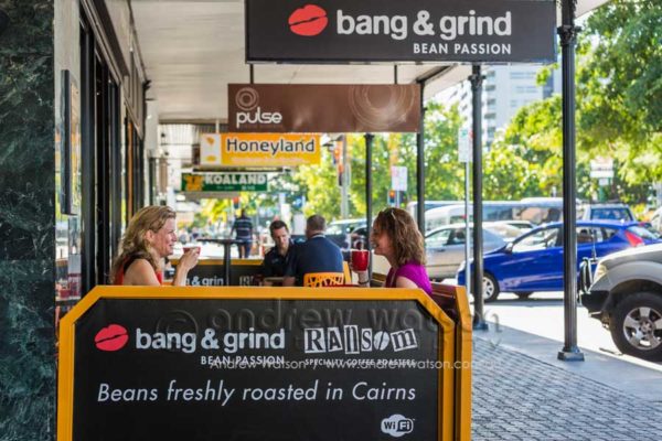 Women drinking coffee outside Bang & Grind Cafe, Cairns