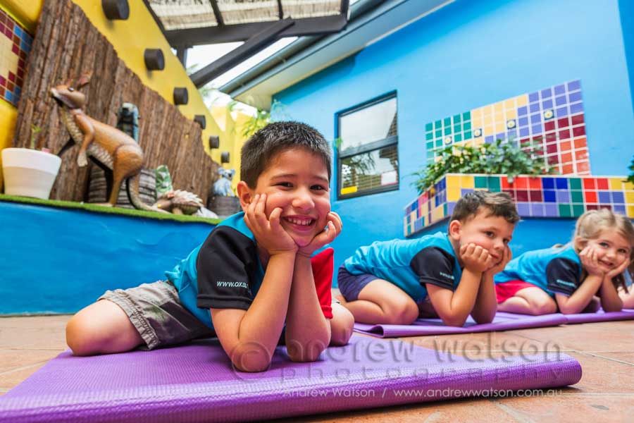 Children engaged in yoga class at Pelicans Childcare