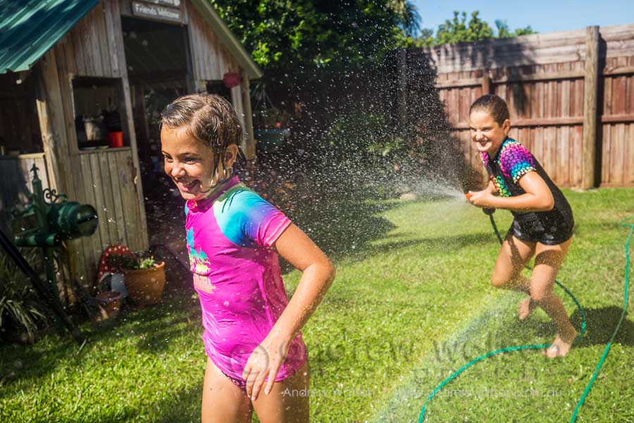 Lifestyle image of kids playing in backyard