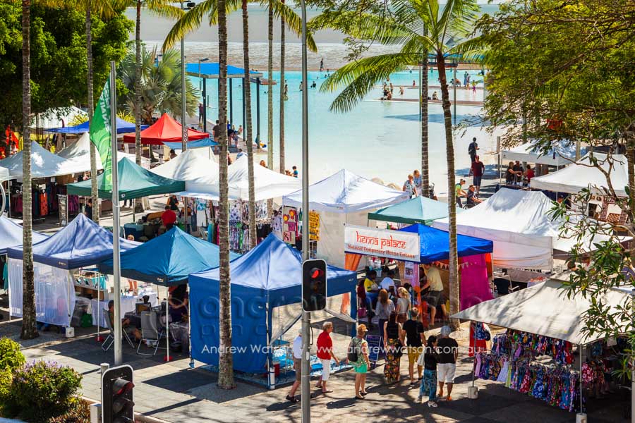 Stalls beside the lagoon at the Cairns Esplanade Markets
