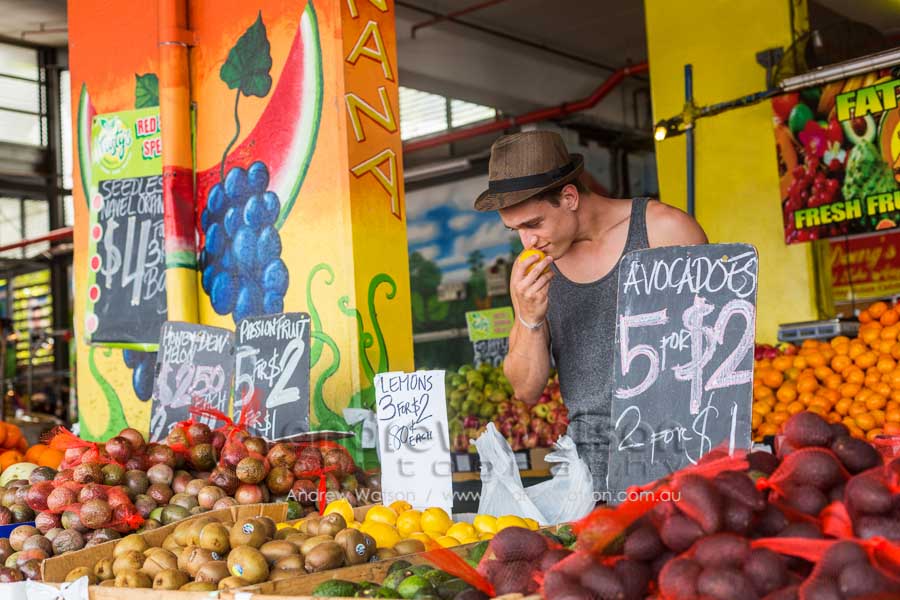 Man shopping for fresh produce at Rustys Markets, Cairns