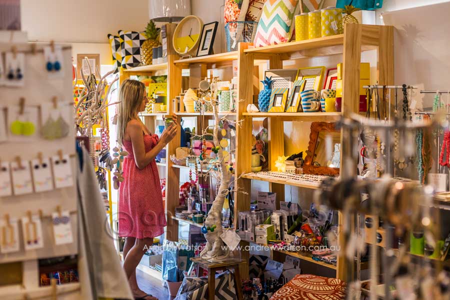 Woman shopping for homewares at With Sugar, Port Douglas