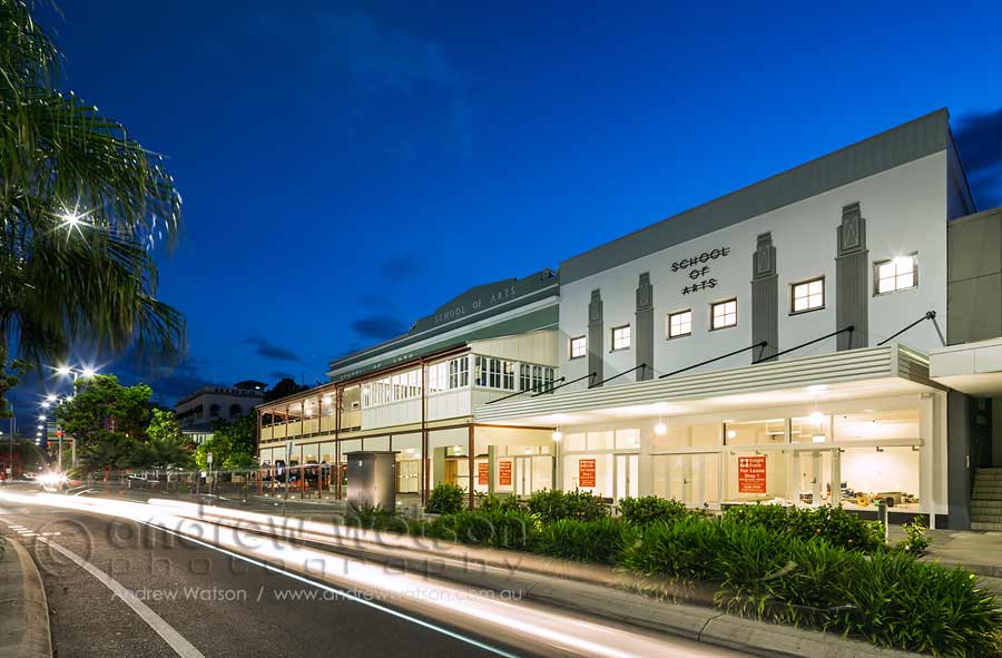 Twilight image of art deco style facade of the Cairns School of Arts building