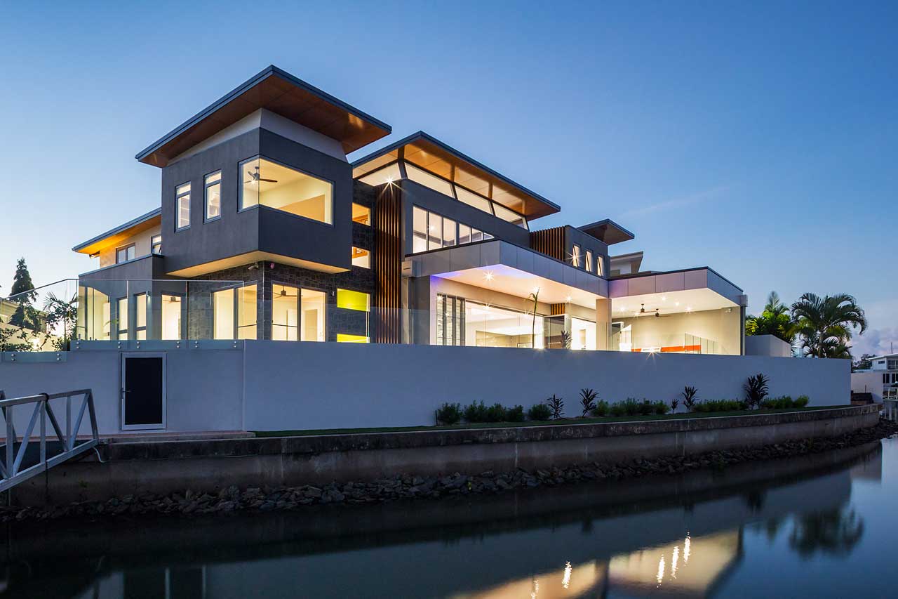 Twilight image of waterfront home in Bluewater, Cairns