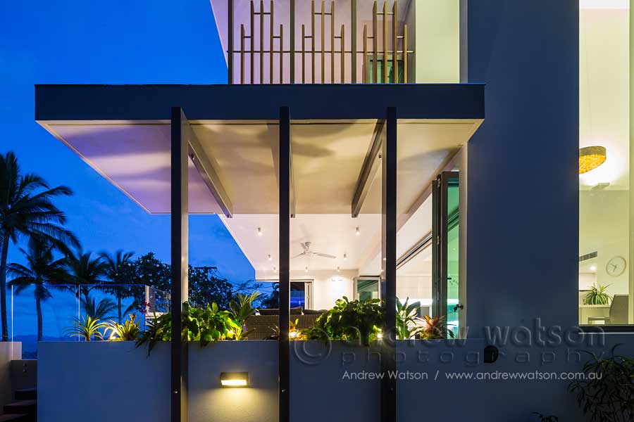 Twilight exterior image of architectural beachfront home in Cairns