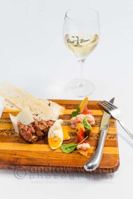 Image of beef tartar dish on wooden board