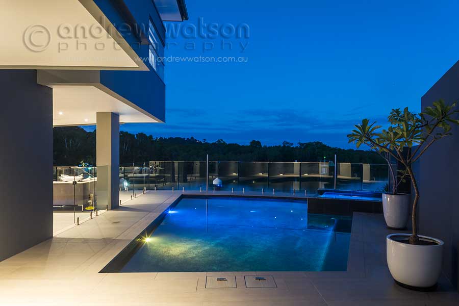 Twilight image of waterfront home in Bluewater, Cairns