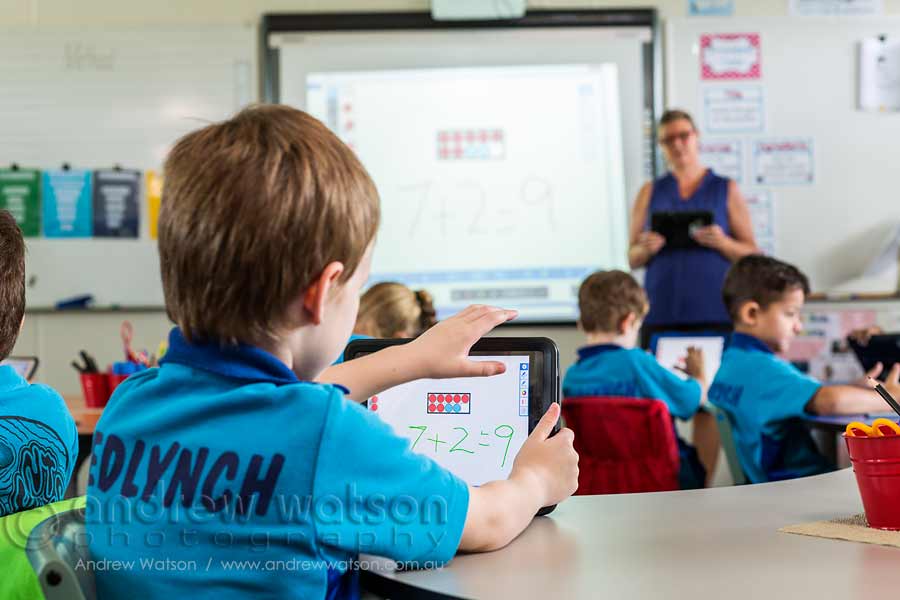 Image of student using iPad in the classroom