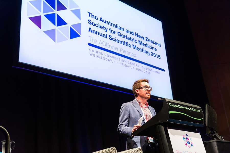 Image of conference MC during plenary sessions of ANZSGM 2016