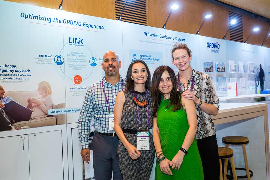 Image of exhibitor staff at CNSA Annual Congress trade exhibition