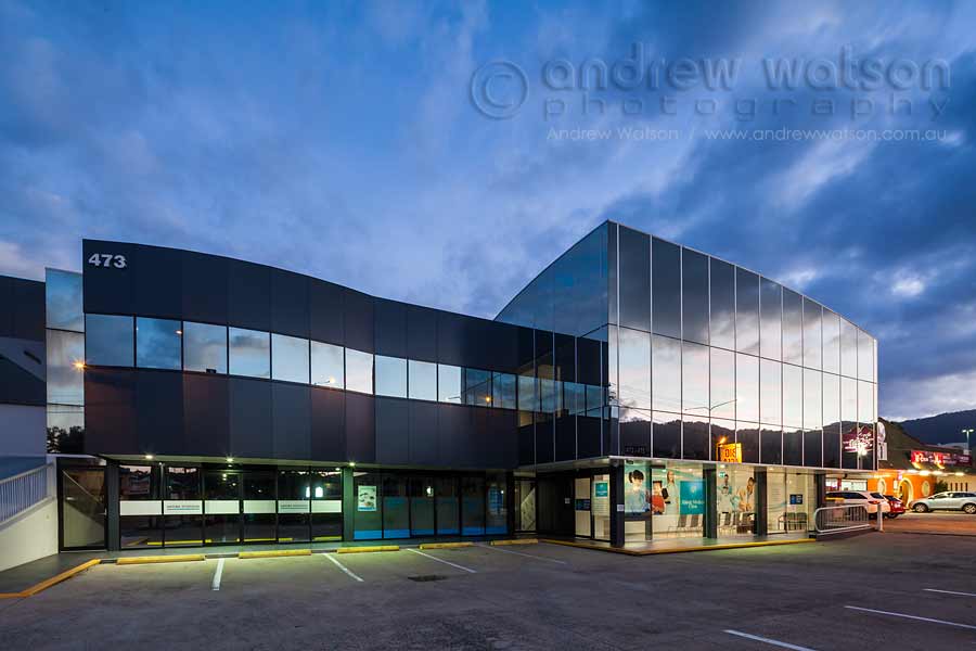 Twilight image of Abbott Medical Clinic building at night