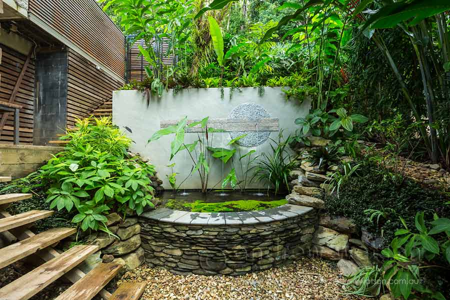 Image of water fountain in a residential tropical garden in Port Douglas