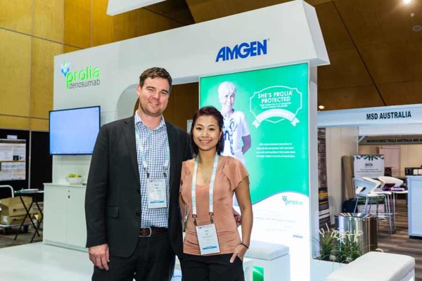 Image of delegates in front of trade exhibit booth at ANZSGM 2016