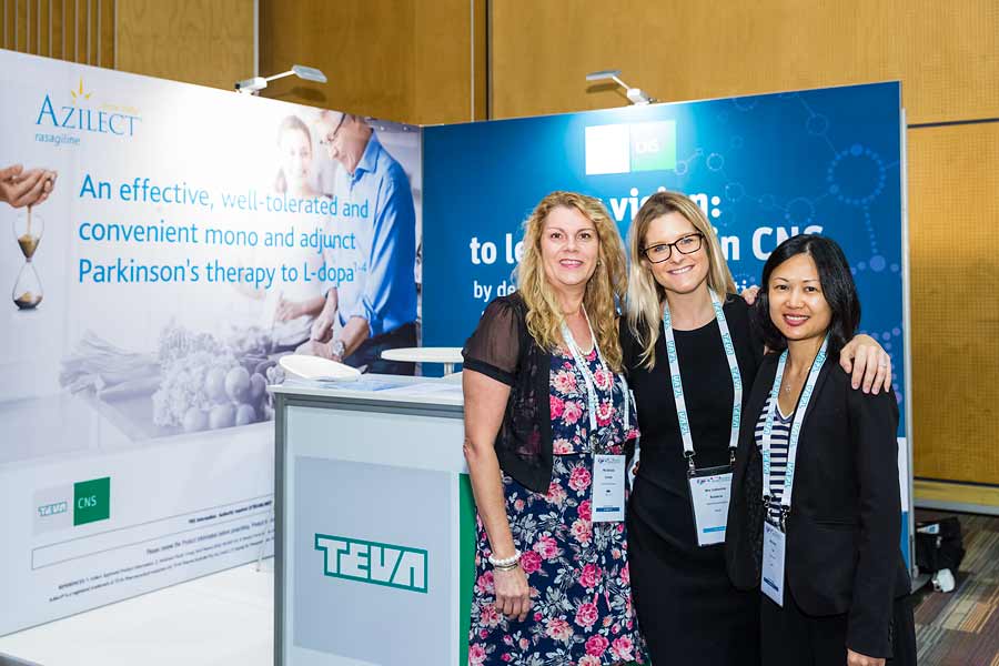 Image of delegates in front of trade exhibit booth at ANZSGM 2016