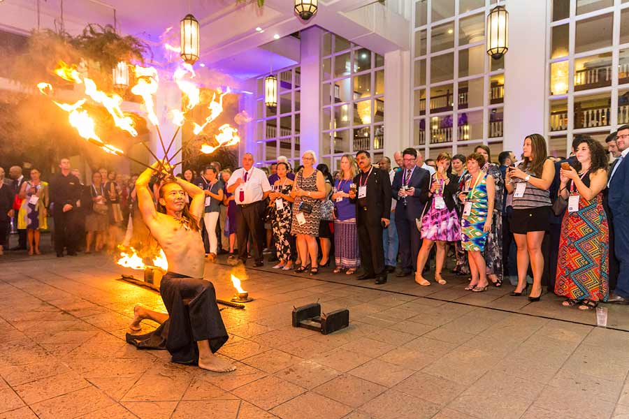 Image of fire dancer performing at dinner reception during ANZA 2017