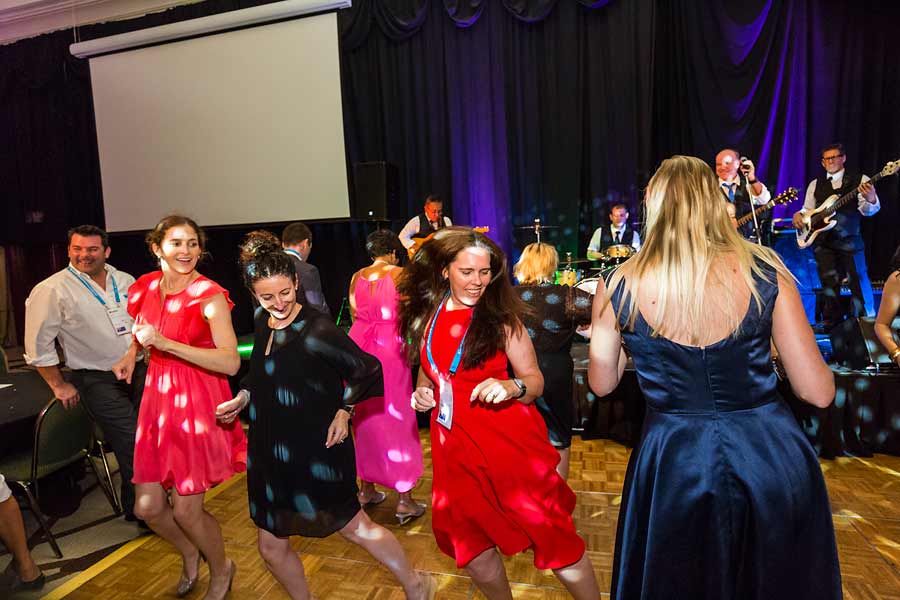 Image of delegates dancing at dinner reception during ANZA 2017