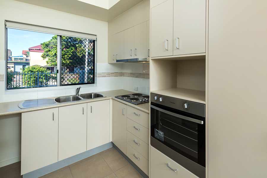 Image of the kitchen area in a unit housing development, Thursday Island
