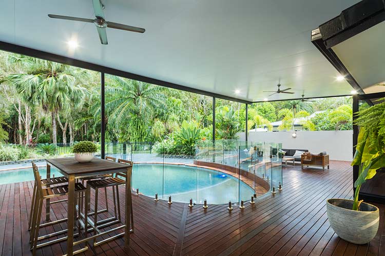 Wooden deck and swimming pool of Kewarra Beach residential home