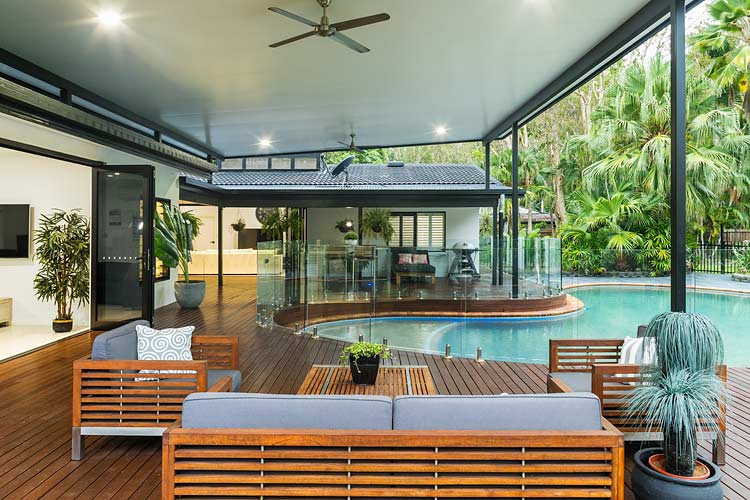 Outdoor entertaining area and pool deck of residential home