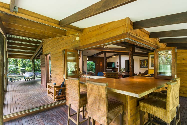 Outdoor dining benchtop and deck area of Daintree holiday cottage
