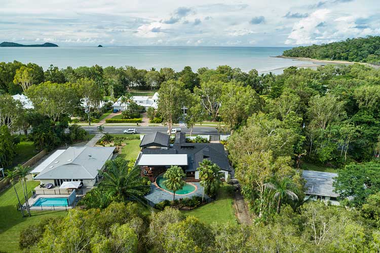 Aerial view of residential home and nearby Kewarra Beach