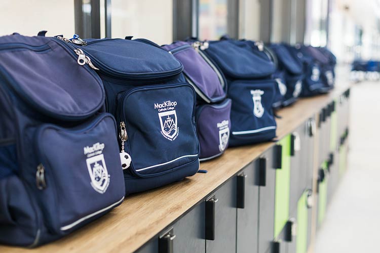 School bags lined up on top of school lockers