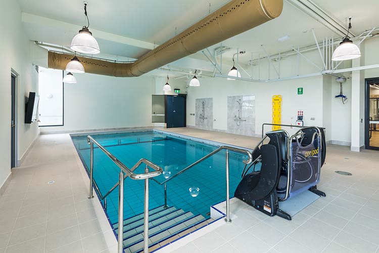 An indoor hydro pool with disability access lift