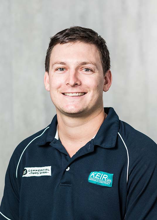Corporate headshot of a male construction company staff member