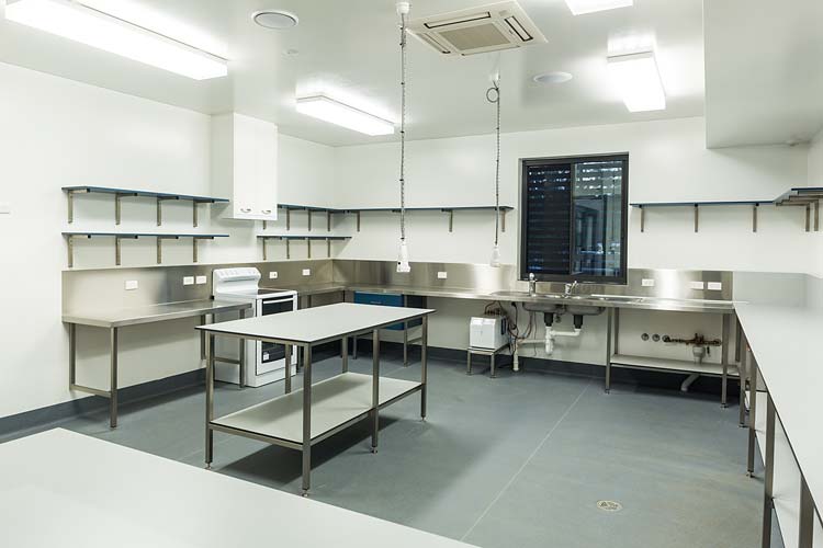 Interior of Trinity Bay High School multi purpose hall showing kitchen facilities