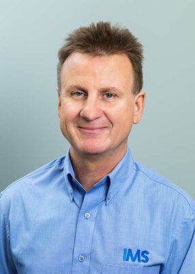 Corporate headshot of a male administrator at a Cairns medical centre