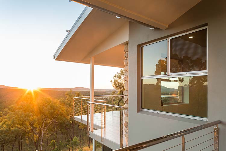 Exterior of the Walsh River House showing sunrise views over the surrounding bushland