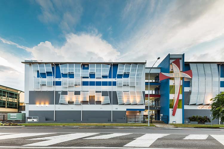 Exterior of the St Monica’s College building extension in Cairns at twilight