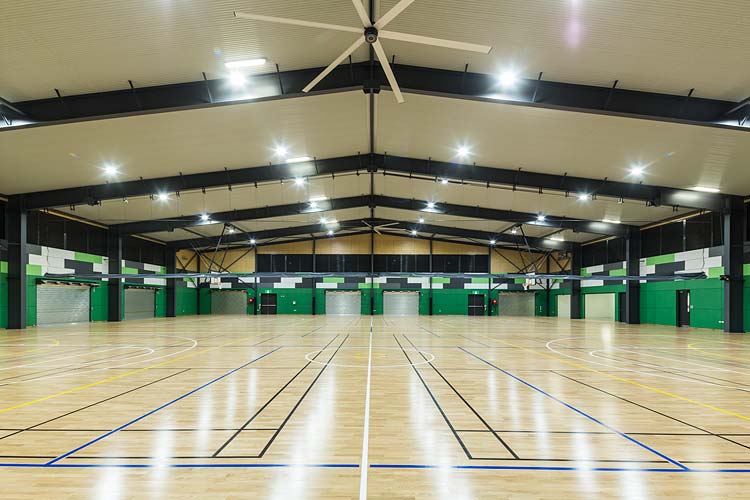 Interior of Trinity Bay High School multi purpose hall showing sports courts
