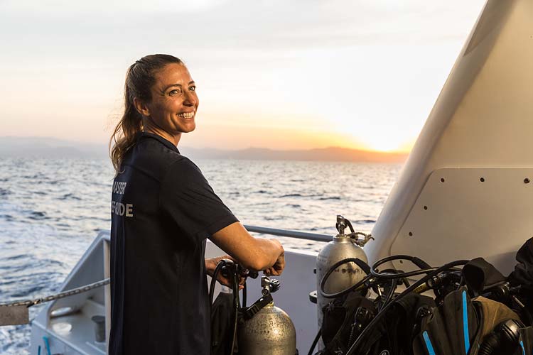 Portrait of Master Reef Guide Michelle Barry on the dive deck of a reef boat