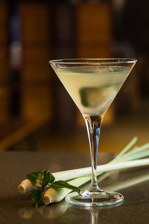 A martini cocktail featuring lemongrass and kaffir lime leaves
