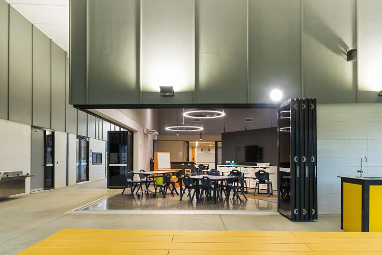 Interior of new school learning precinct with view through to open classroom