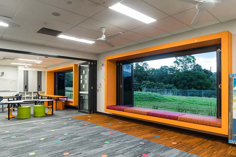 Interior of new school learning precinct with colourful window seating
