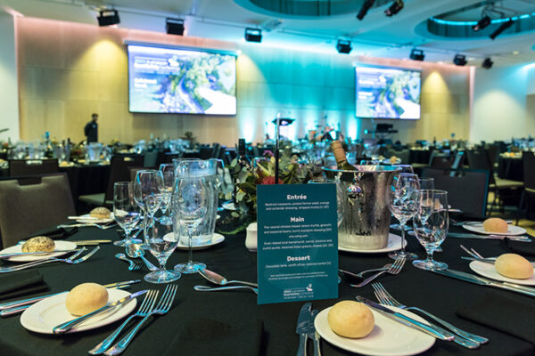 Table laid out with menu for conference awards dinner