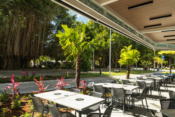 Tables and chairs of cafe along the Esplanade dining precinct