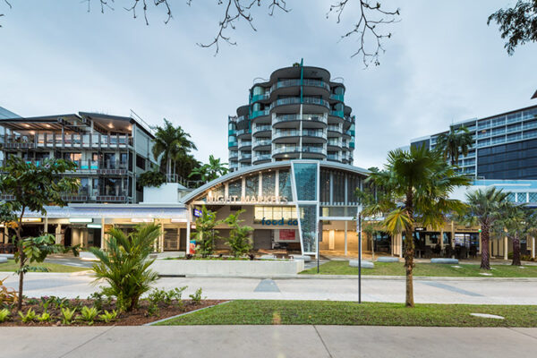 Entrance of Night Markets building featuring seating and paved areas