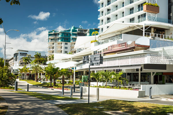 Restaraunt facades and tropical landscaping along Esplanade waterfront