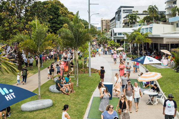 Elevated view of people walking and seated along Esplanade promenade