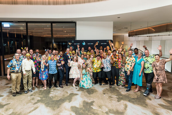 Gropu photo of delegates at conference dinner